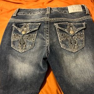 Selling a cute miss me jeans size 28 boot cut
